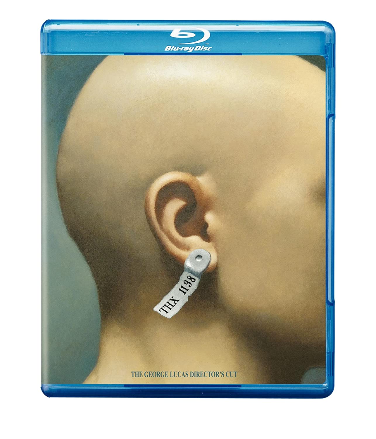 The Blu-Ray cover of the Warner Pictures home video release of the 1971 film, THX-1138. The cover shows a close-up profile view of a bald person with an ear-tag labeling them as THX-1138.